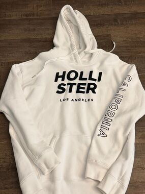 Hollister White Pullover with black Logo Patch